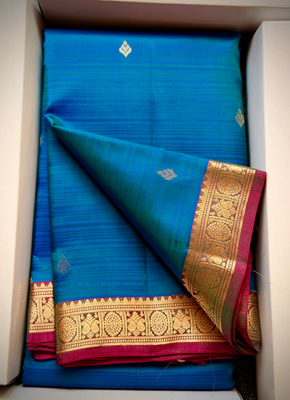 The Iridescent Muse: Peacock Double-Shaded Silk Saree