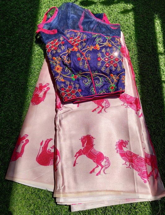 Pink animal print saree with blue ready made heavy work blouse