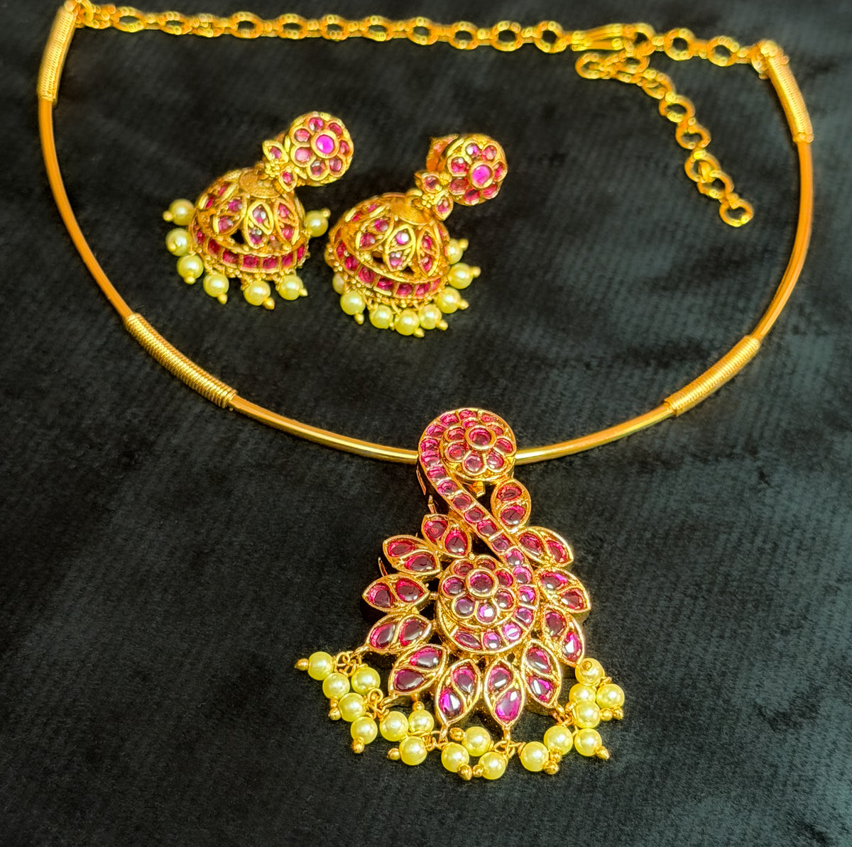 Contemporary Ruby Pink Stone Gold-Plated Pendant Necklace Set with Pearl Jhumkas