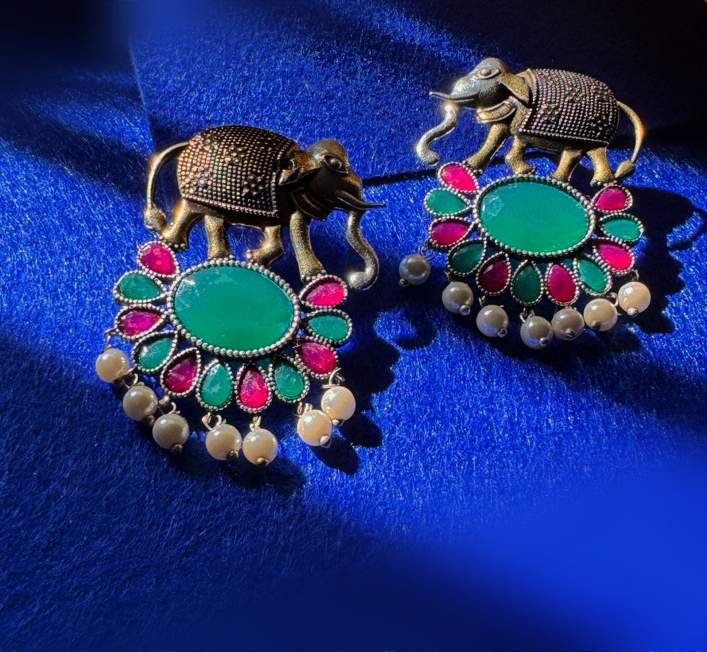 Dual tone hathi earrings