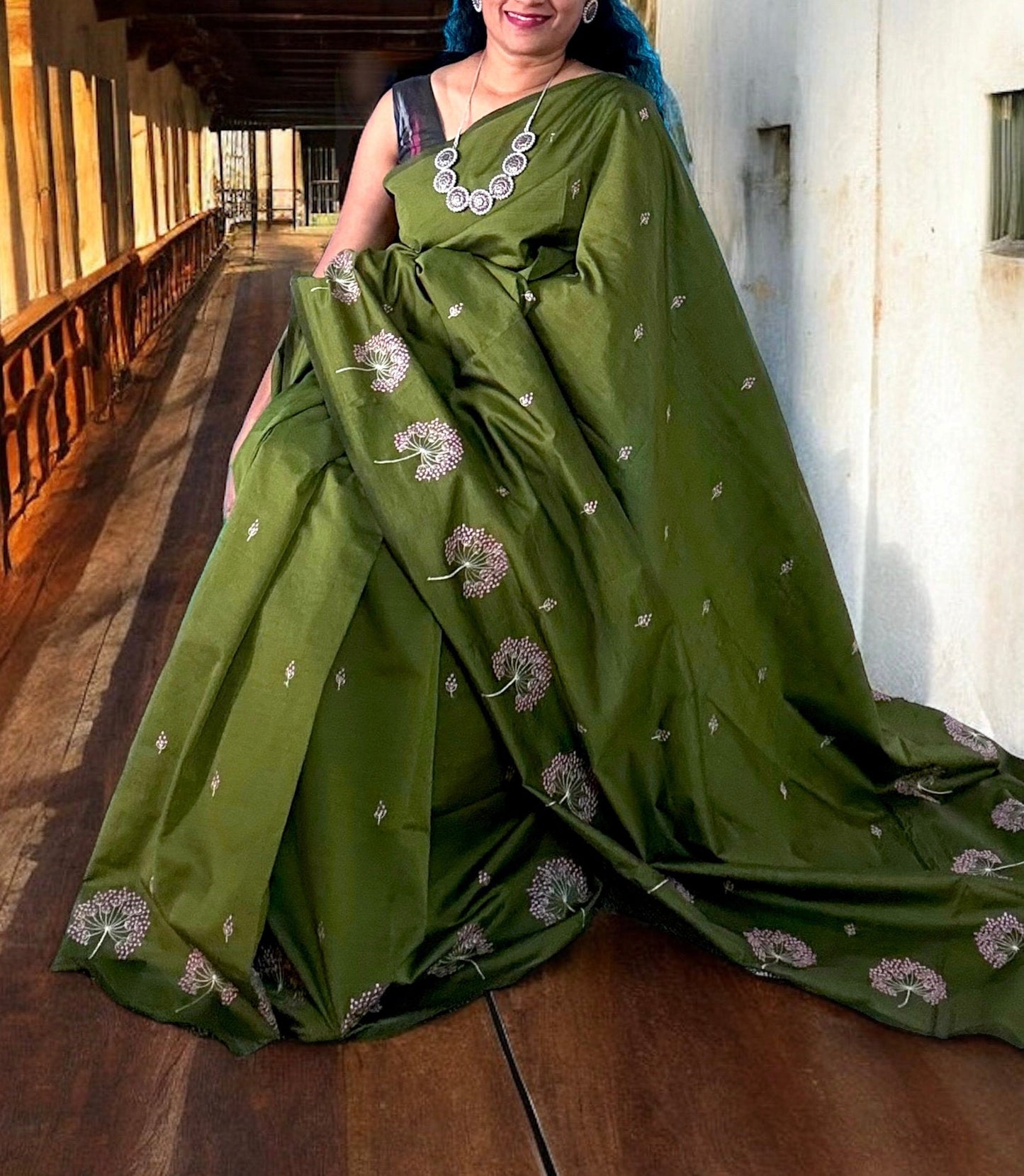 Mesmerizing Mehandi Green Saree