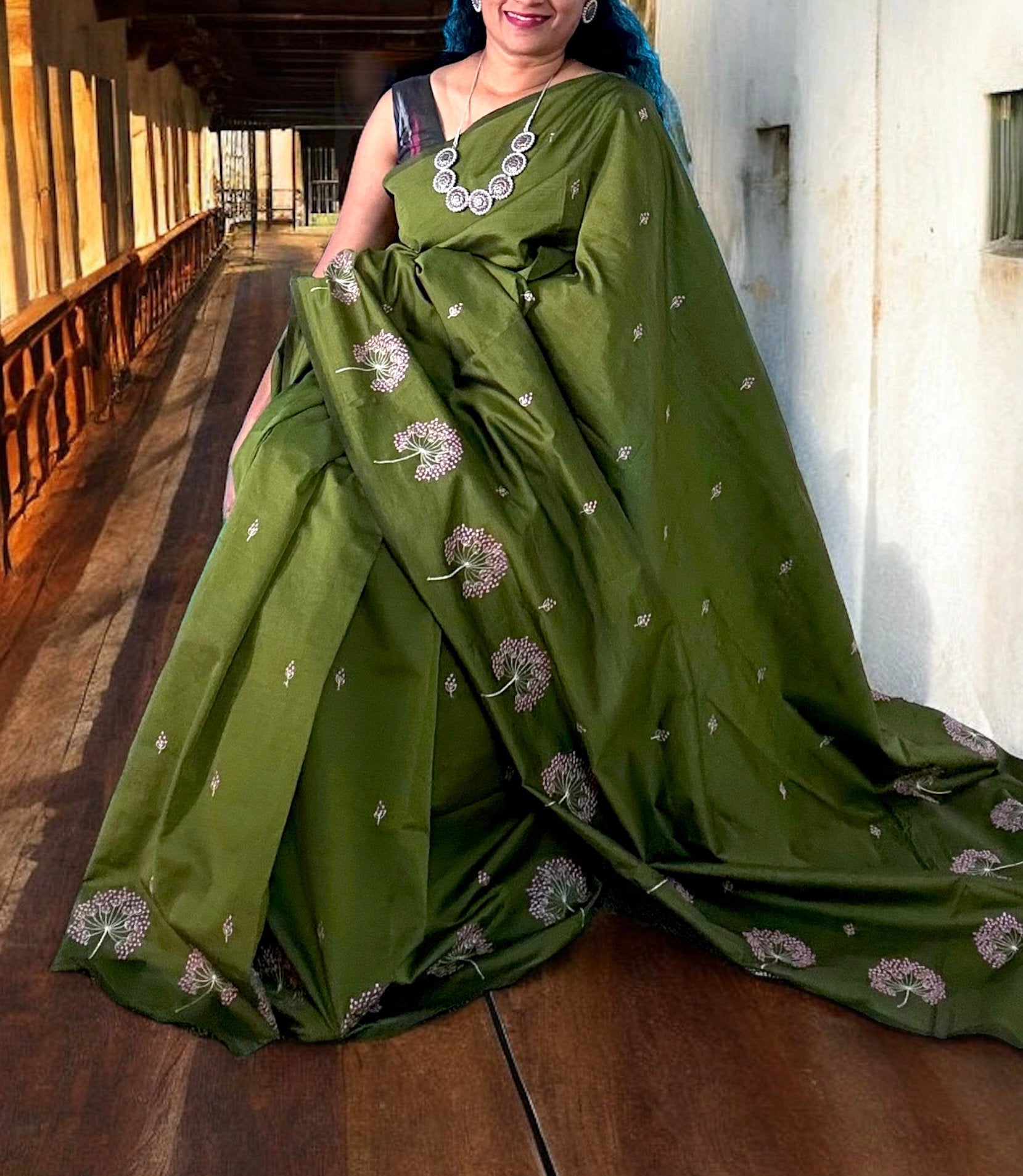 Mesmerizing Mehandi Green Saree