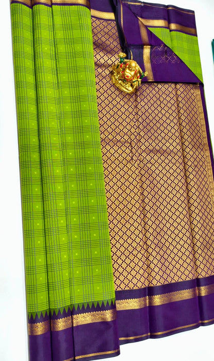 Emerald Vineyard | Parrot Green Kanchipuram Korvai Silk with Plum Purple Pallu