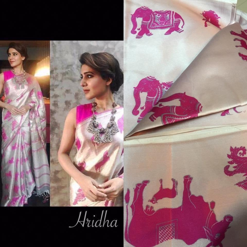Pink animal print saree with blue ready made heavy work blouse