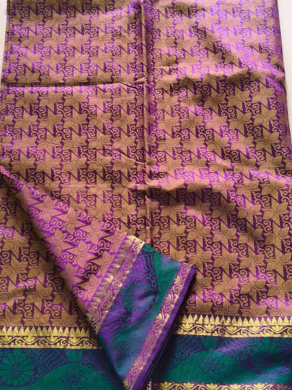 Luminous Dual-Tone Purple and Green Silk Cotton Woven Saree with Zari Motifs
