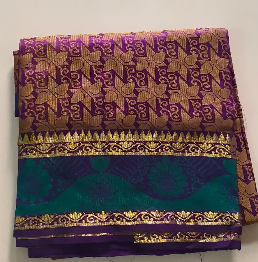 Luminous Dual-Tone Purple and Green Silk Cotton Woven Saree with Zari Motifs