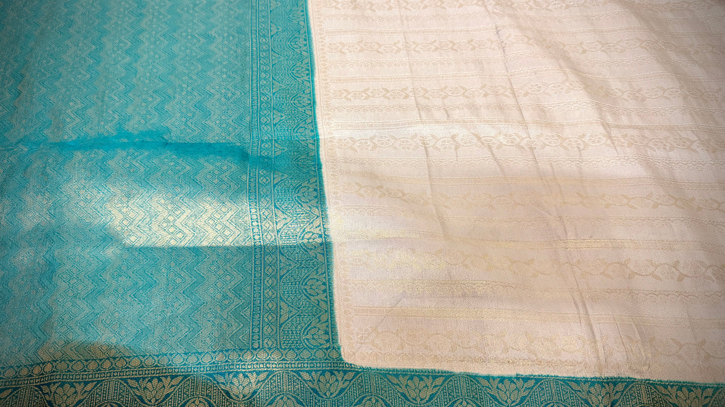 The Teal & Ash Grey Brocade Soft Silk Saree – Hridha