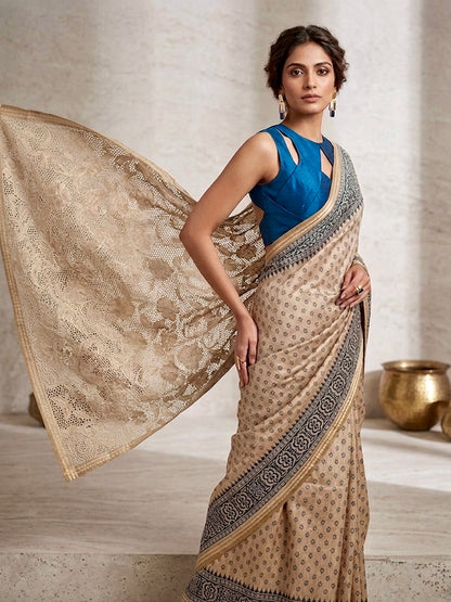 Ivory Filigree | Beige Tussar Silk Saree with Ornate Cutwork Pallu